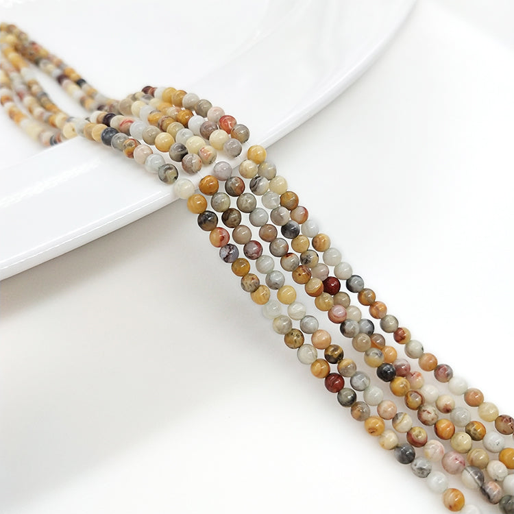 ----3mm round natural crystal beads