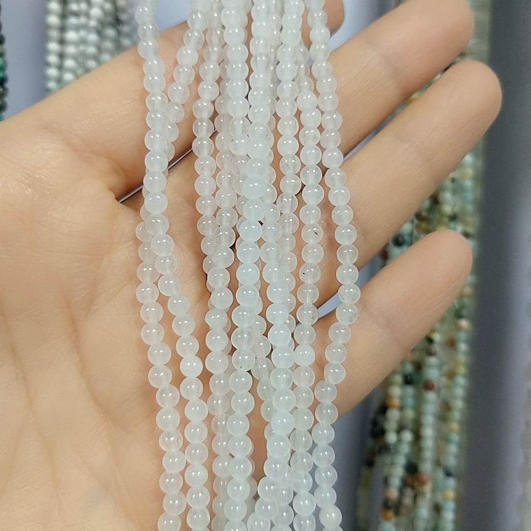 ----3mm round natural crystal beads